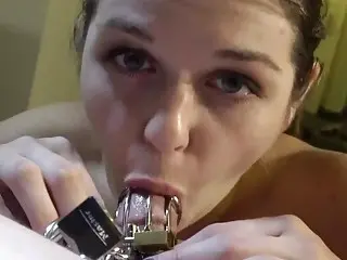 Girl puts a chastity cage on you and sucks you